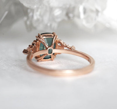 Green cushion-cut sapphire ring with side diamonds