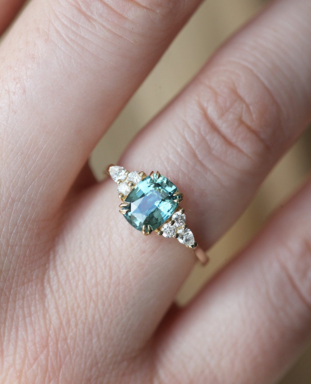 Blue cushion-cut ceylon sapphire ring with side diamonds