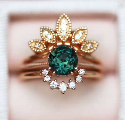 Round blue green solitaire sapphire ring