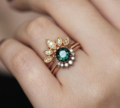 Round blue green solitaire sapphire ring