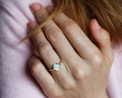 Three-Stone Oval Opal Ring with 2 Side Round White Diamonds