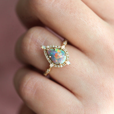 Pear Opal Halo Ring with Side Round White Diamonds and Pear Opals