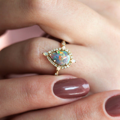 Pear Opal Halo Ring with Side Round White Diamonds and Pear Opals