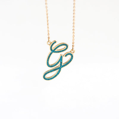 Turquoise Inlay Gold Necklace with Gemstone in the shape of the letter 'G'