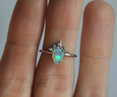 White Pear Opal Ring with Side Round and Pear Diamonds