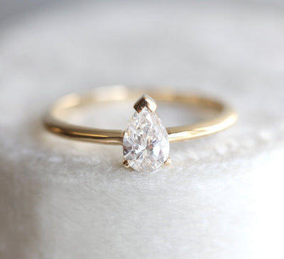 Pear White Diamond Solitaire Ring with timeless design