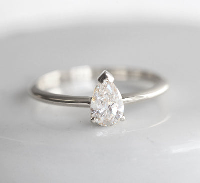 Pear White Diamond Solitaire Ring with timeless design