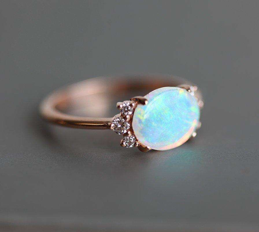 Oval Opal Ring with Side White Round Diamonds