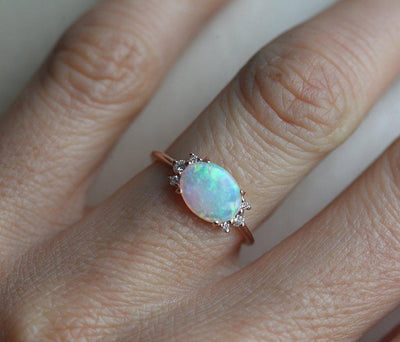 Oval Opal Ring with Side White Round Diamonds