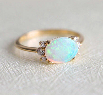 Oval Opal Ring with Side White Round Diamonds