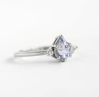 Pear-shaped lavender sapphire ring with side diamonds