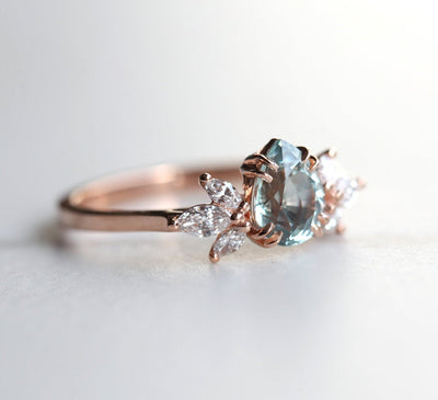 Pear-shaped sapphire ring with side diamonds