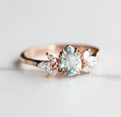 Pear-shaped sapphire ring with side diamonds