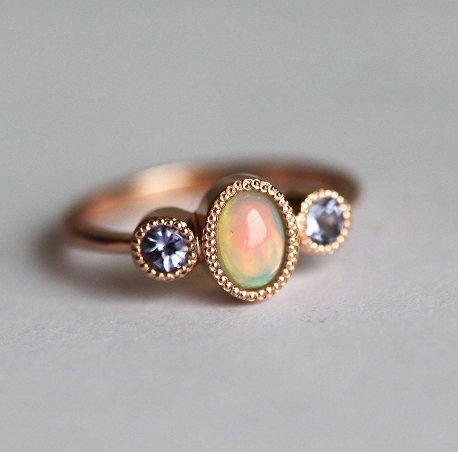 Three-Stone Oval Opal Ring with 2 Side Round Tanzanite Gemstones