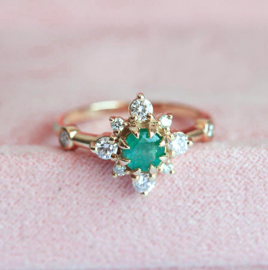 Vintage-inspired Emerald Ring in 14k yellow gold with green emerald and diamonds.