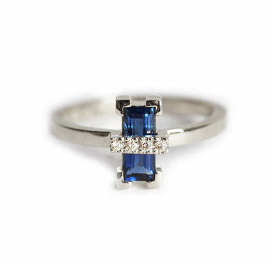 Baguette-shaped blue sapphire ring with white side diamonds