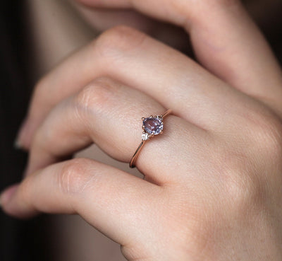 Pear Purple Sapphire Ring with 2 Side Round White Diamonds