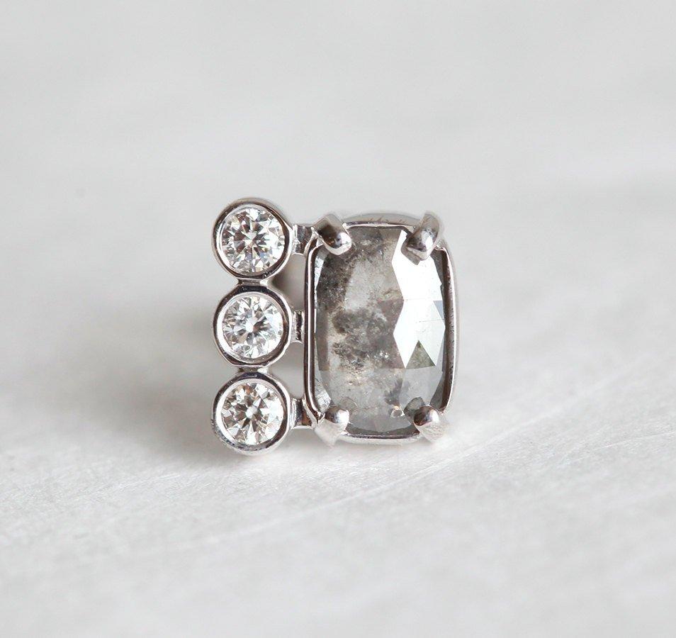 Baguette-cut salt and pepper diamond stud earrings with round white side diamonds