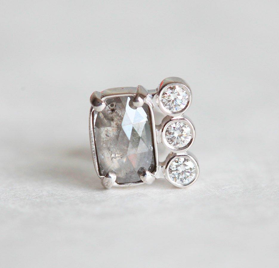 Baguette-cut salt and pepper diamond stud earrings with round white side diamonds