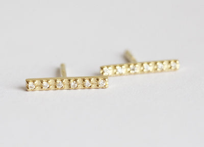 Gold bar with round diamonds stud earrings