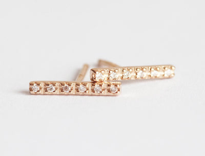 Gold bar with round diamonds stud earrings