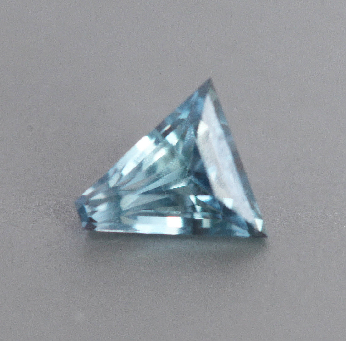 Loose triangle-cut light blue sapphire