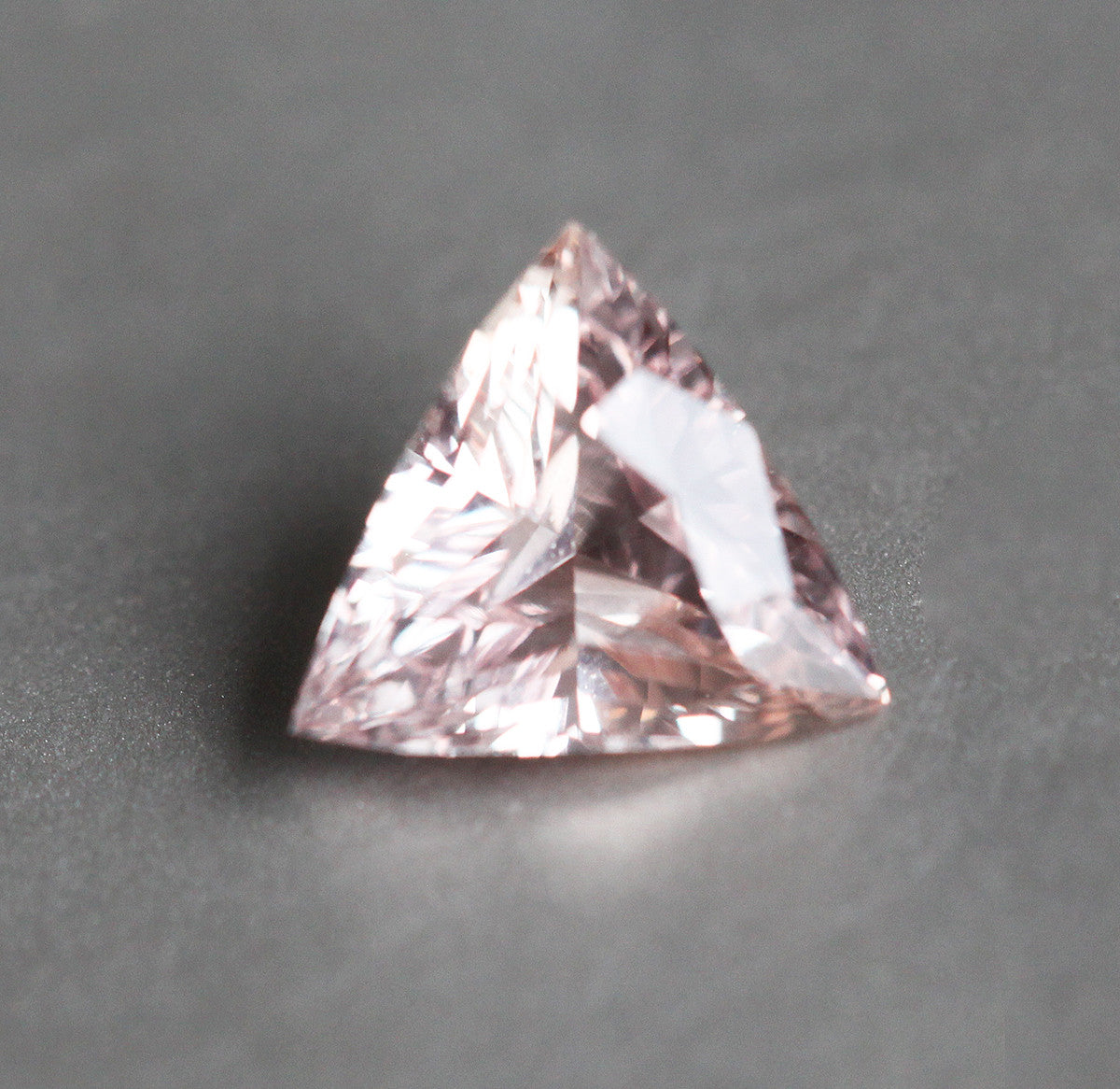 Loose triangle peach pink sapphire