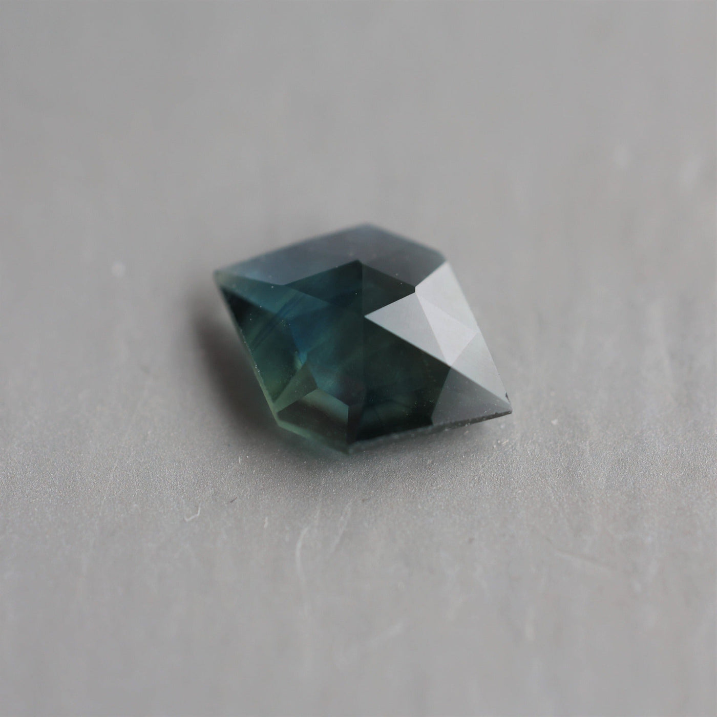 Loose hexagon-shaped teal sapphire