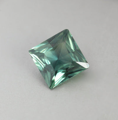 Loose square-shaped teal sapphire