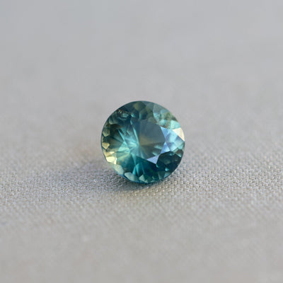 Loose round teal sapphire