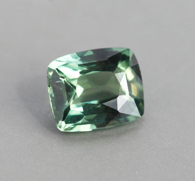 Loose cushion-cut green sapphire