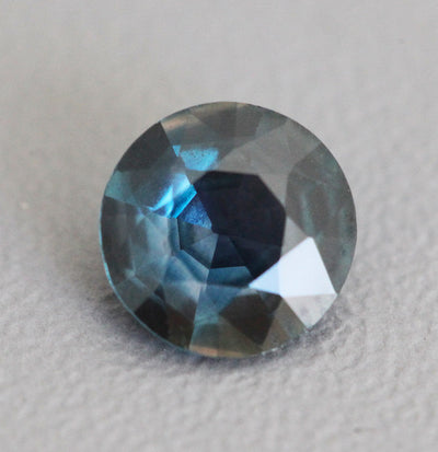 Loose round bi-color sapphire