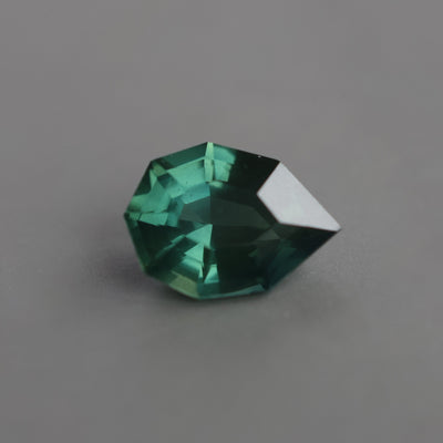 Loose pear-shaped teal sapphire