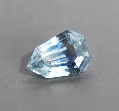 Loose shield-shaped blue sapphire