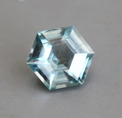 Loose hexagon-shaped seafoam green sapphire
