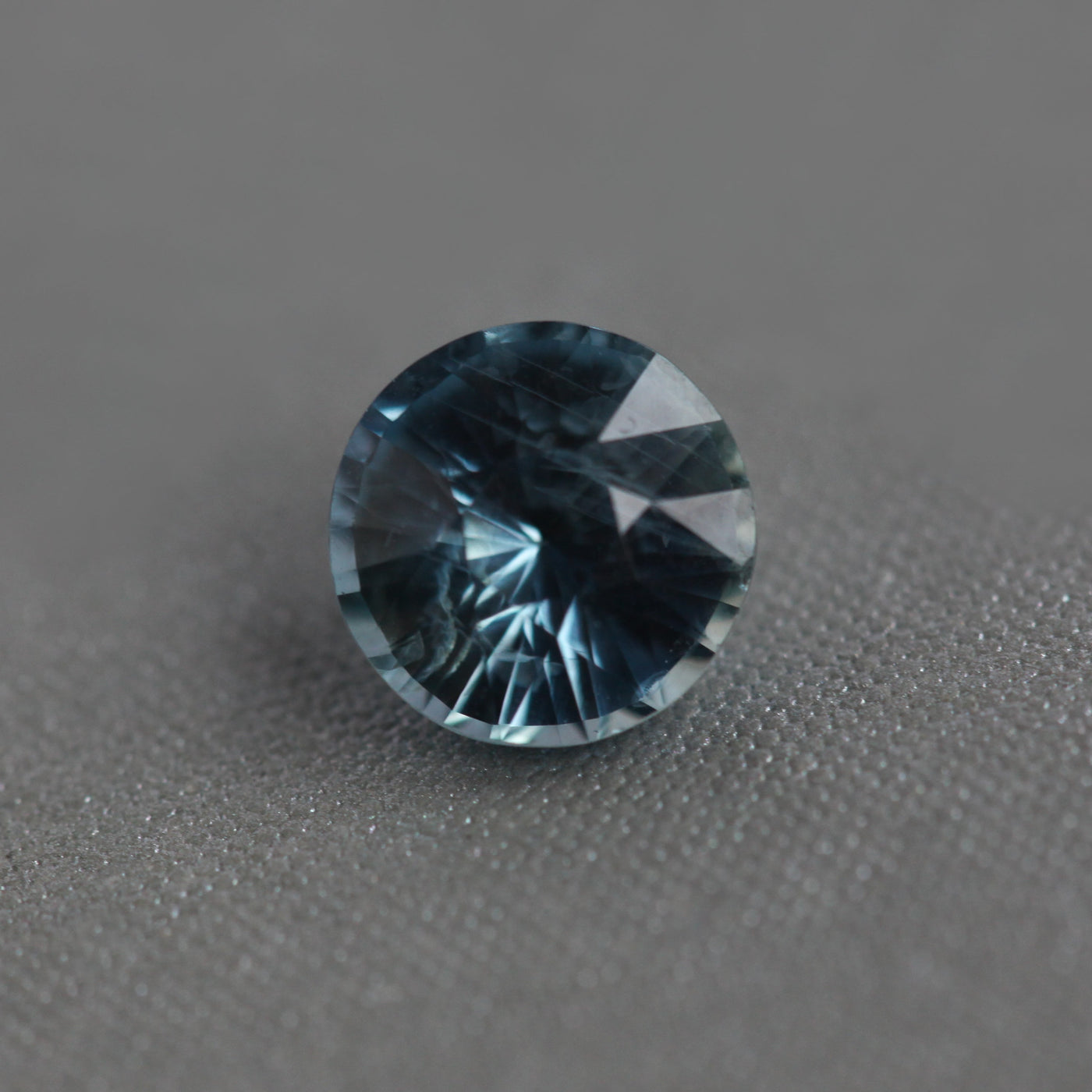 Loose round teal sapphire