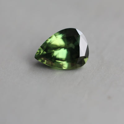 Loose pear-shaped teal sapphire