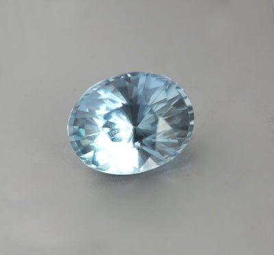 Loose oval-shaped light blue sapphire