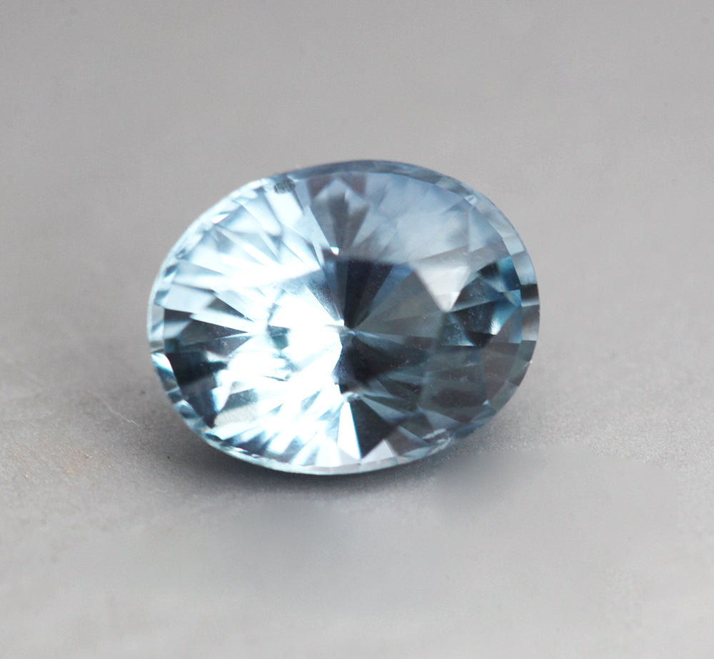 Loose oval-shaped light blue sapphire