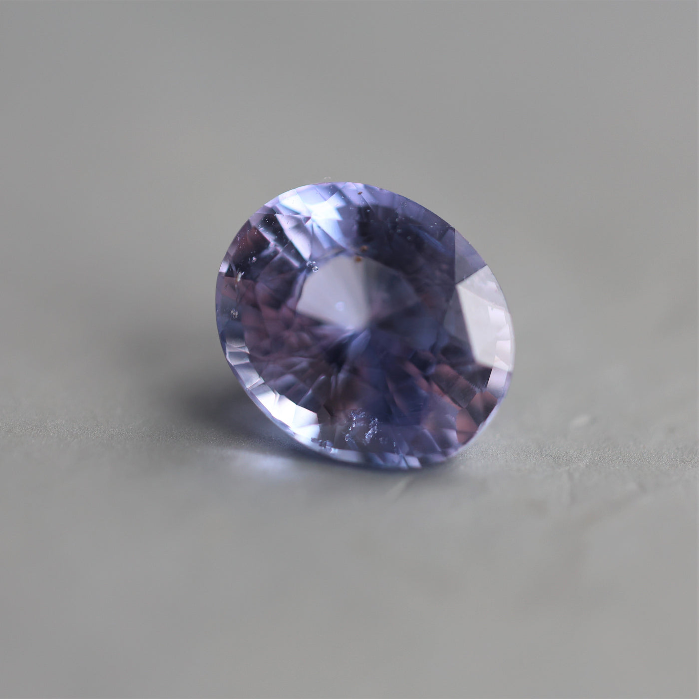 Loose oval-shaped purple sapphire