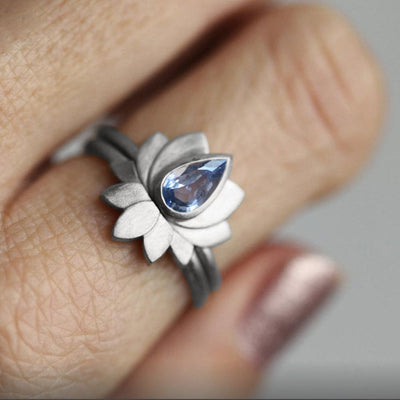 Pear-shaped blue sapphire lotus ring
