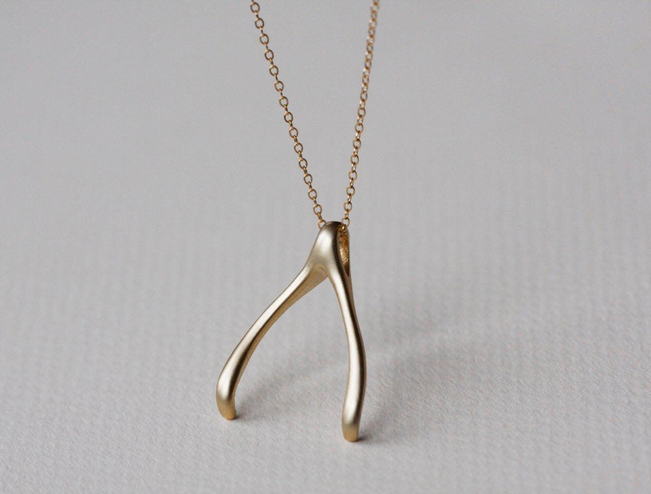 Gold wishbone necklace