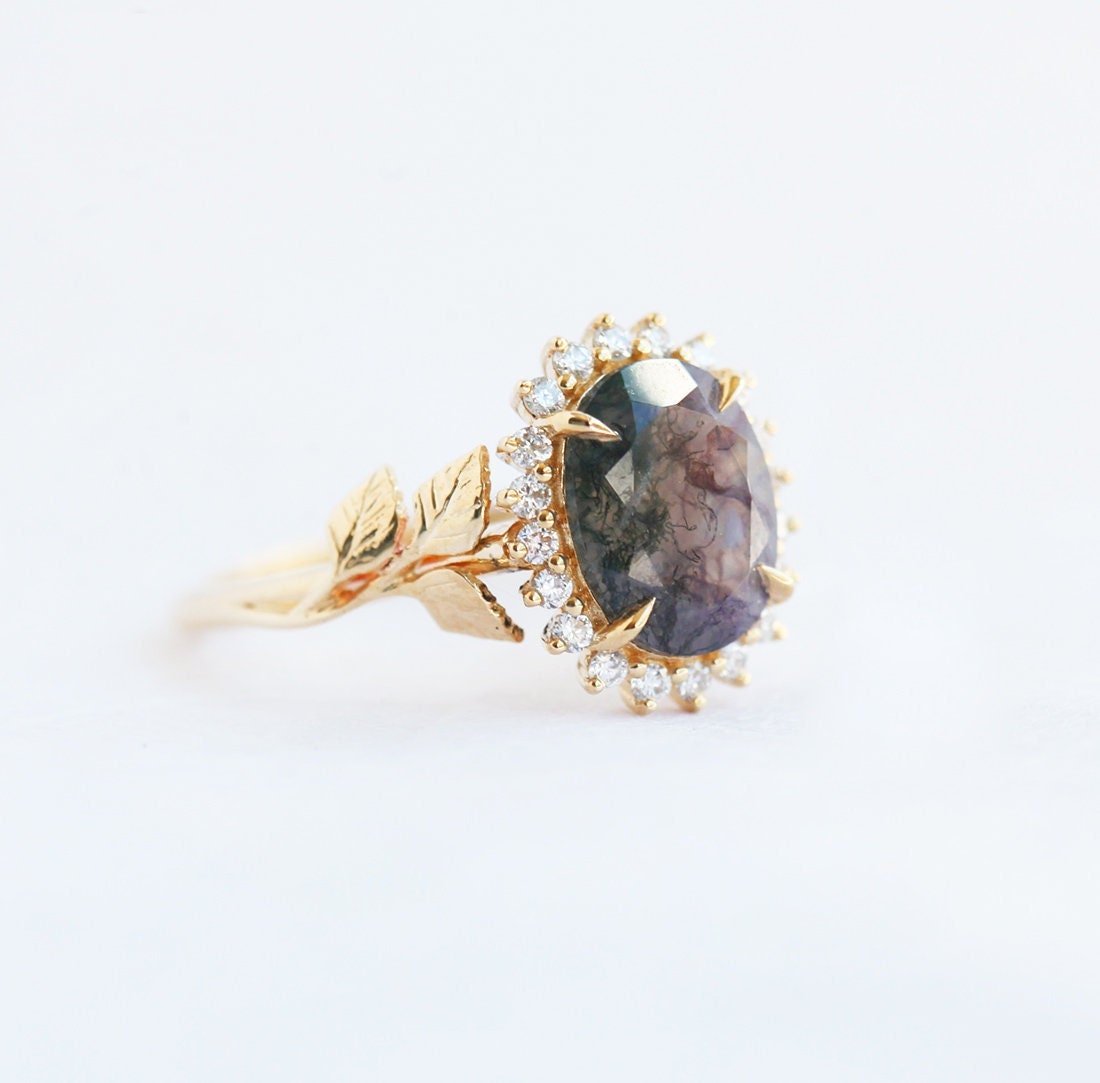Oval Moss Agate Ring with Side Round Diamonds forming a Halo