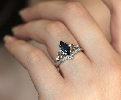 Vintage blue marquise-cut sapphire with side diamonds