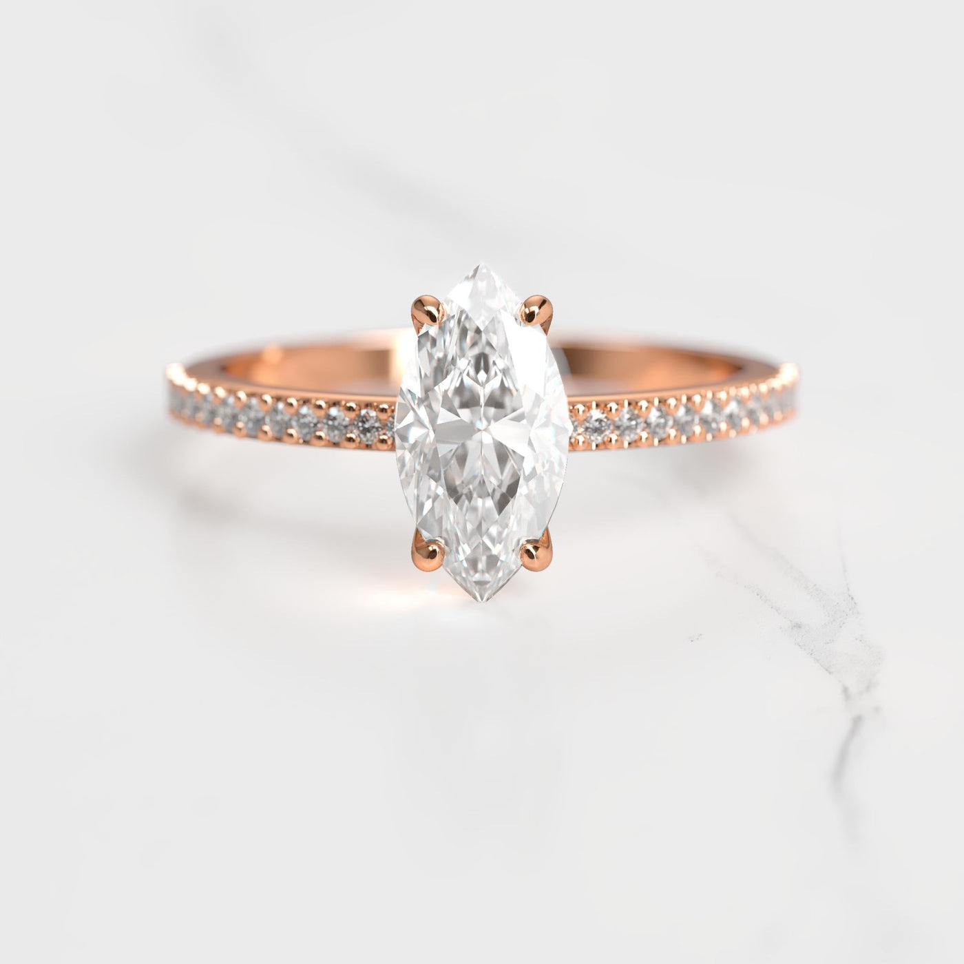 Marquise half pave solitaire diamond ring