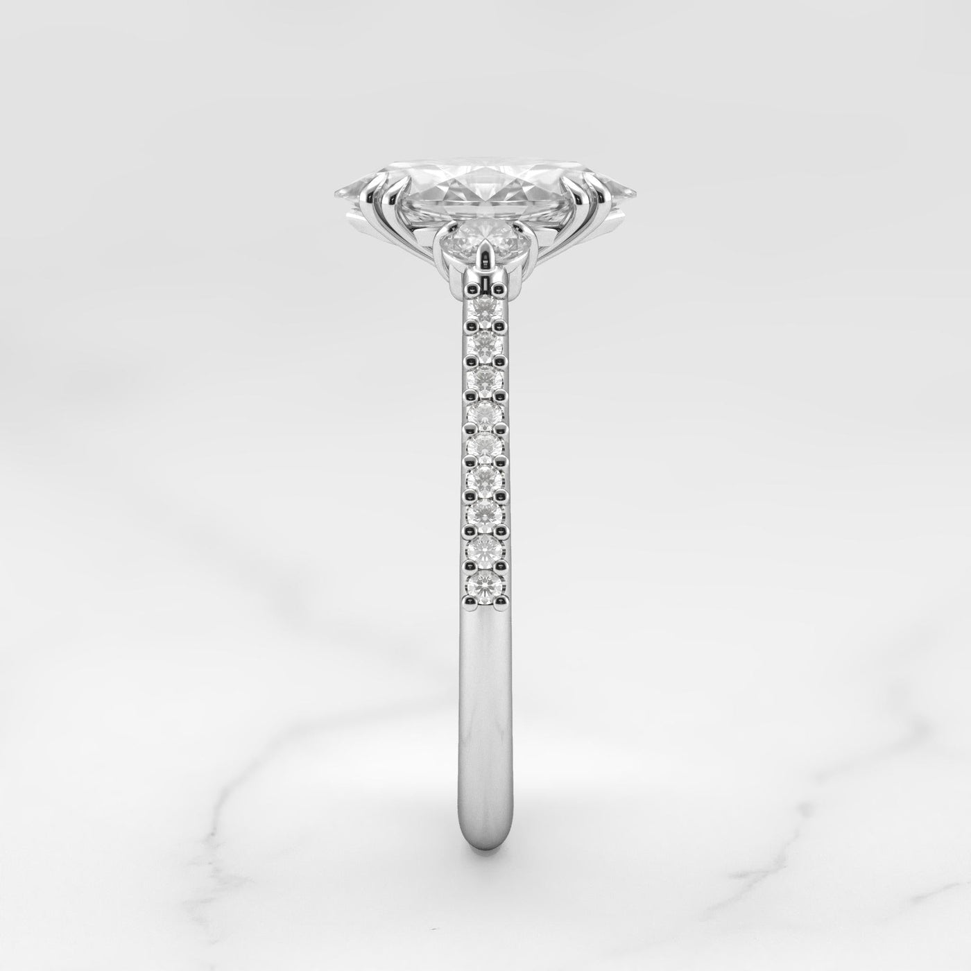 Marquise-cut half pave diamond ring with accent stones