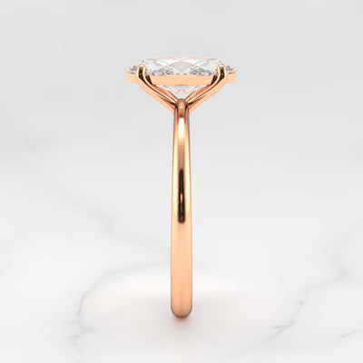 Marquise-cut tapered solitaire diamond ring
