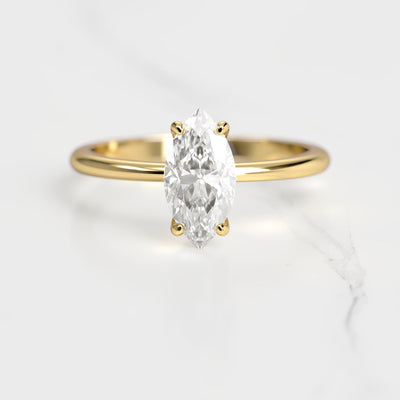 Marquise-cut tapered solitaire diamond ring