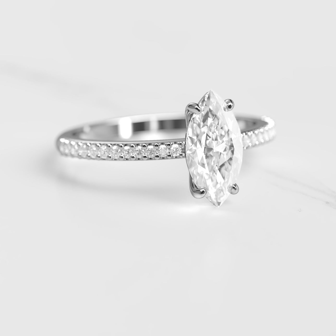 Marquise half pave solitaire moissanite ring