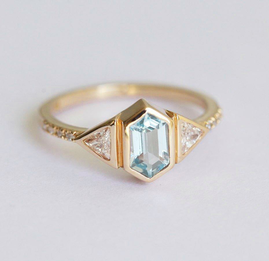 Modern Hexagon Aquamarine Ring with 2 Accent Triangle-Cut White Diamonds and Pave Diamonds